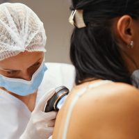 A dermatologist examines the skin. High quality photo